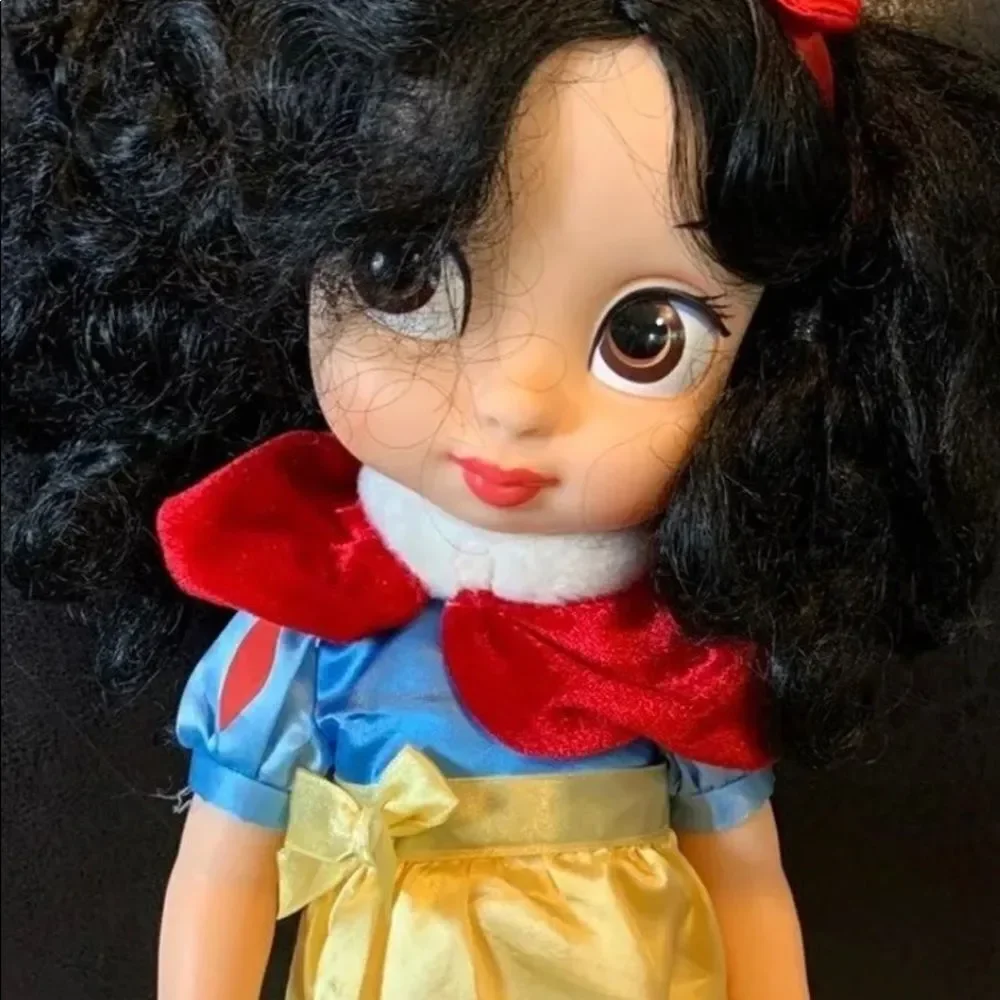 Please see Pictures! No shoes and ink marks on one leg. Exclusive doll!